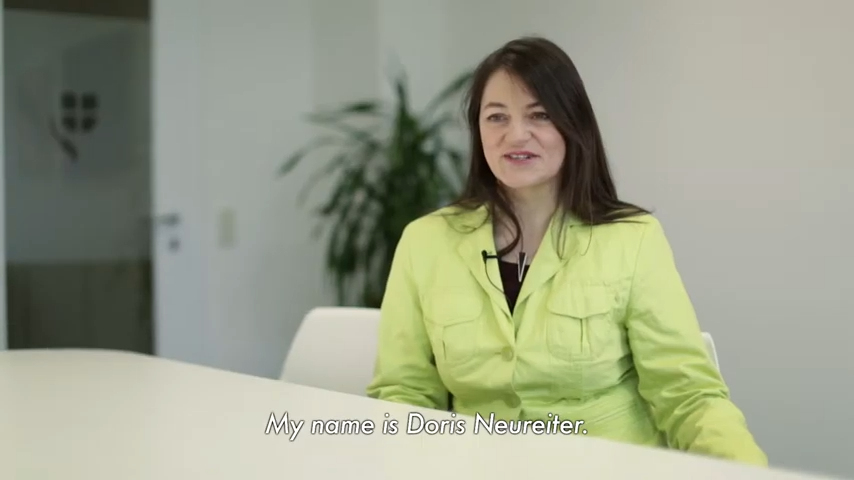 Employee of the VIG Asset Management is sitting at a table