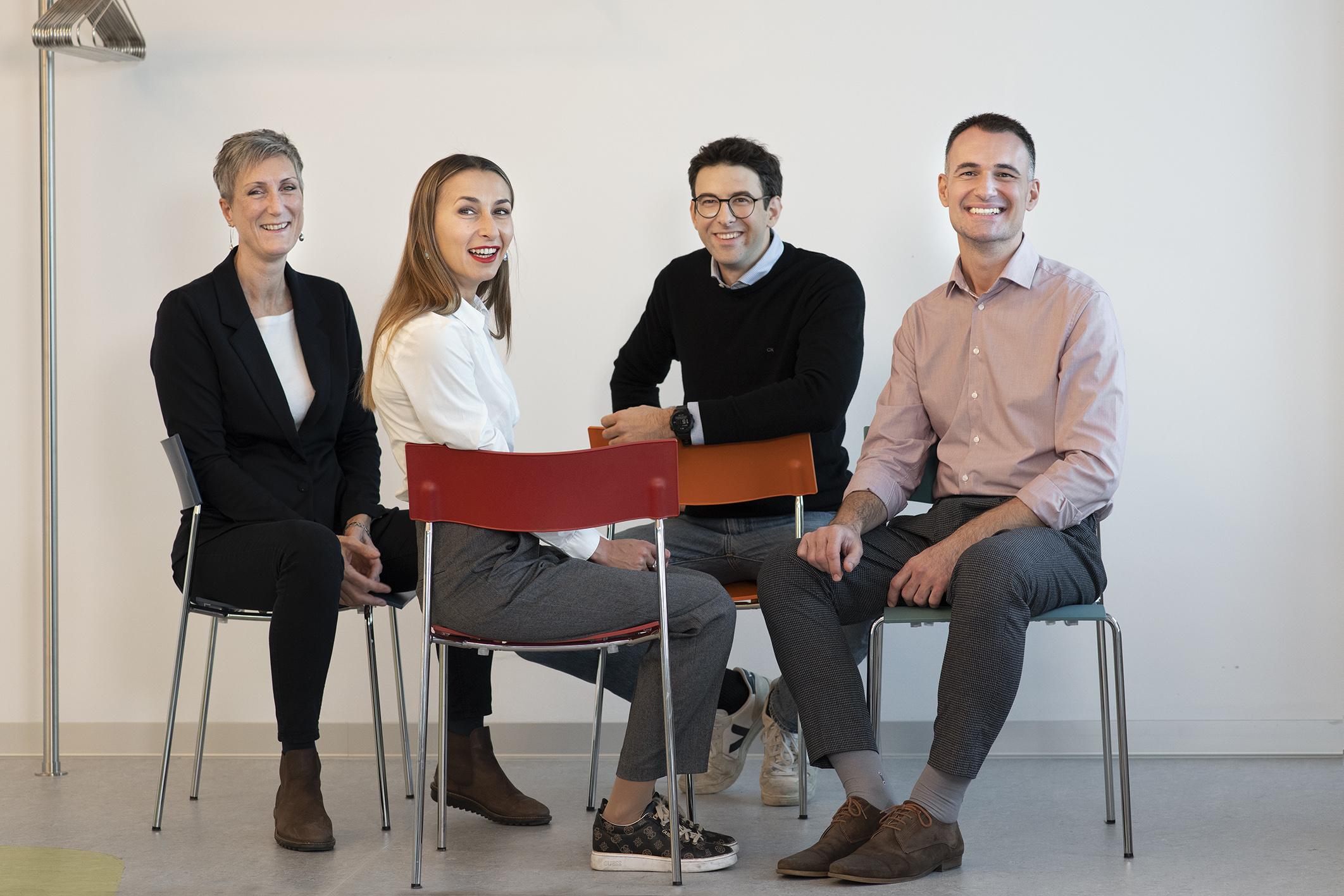 Group of VIG employees are sitting together in circle of chairs