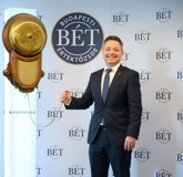 Managing Board member Gabor Lehel rings the bell at the Budapest Stock Exchange in 2022