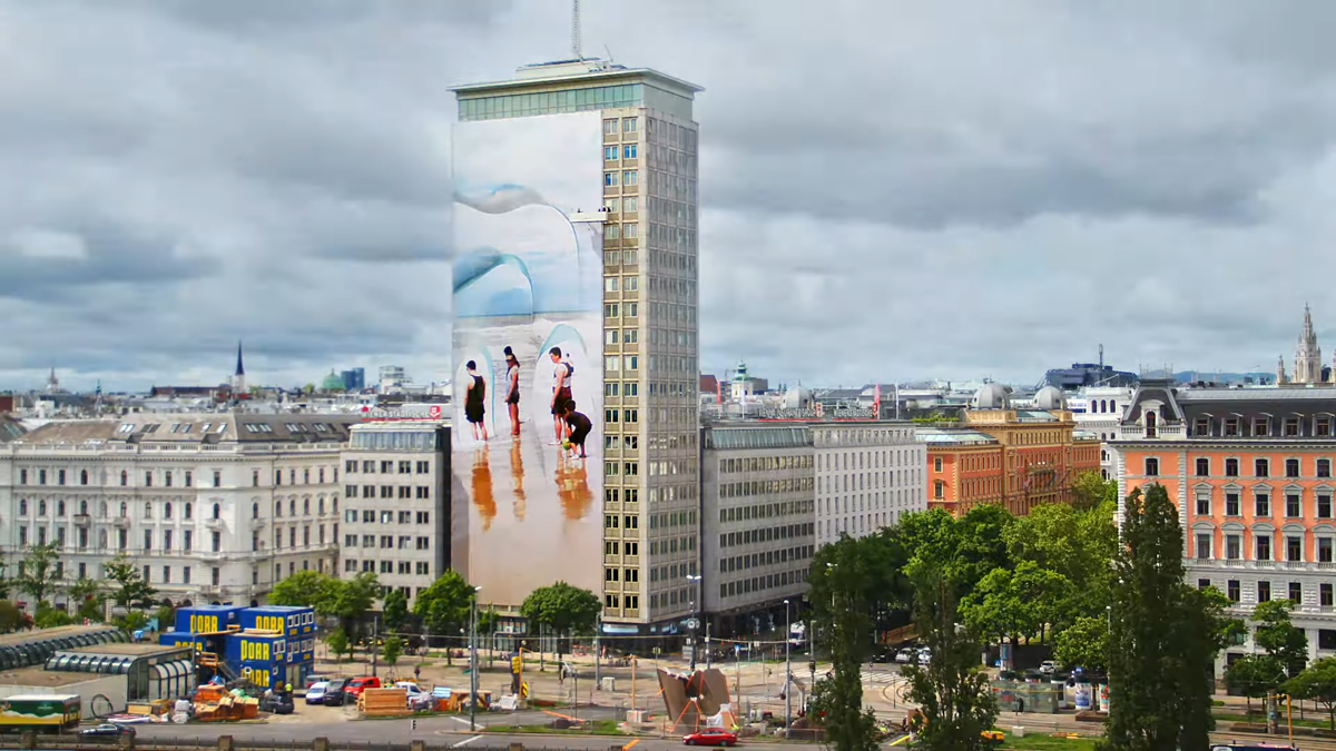 © Rendering/Foto: Wiener Städtische Versicherungsverein/Hertha Hurnaus Facade Art of the Wiener Ringturm 2023 showing the work Wandering Icebergs by Slovenian artist Vanja Bućan in the middle of Vienna's city centre