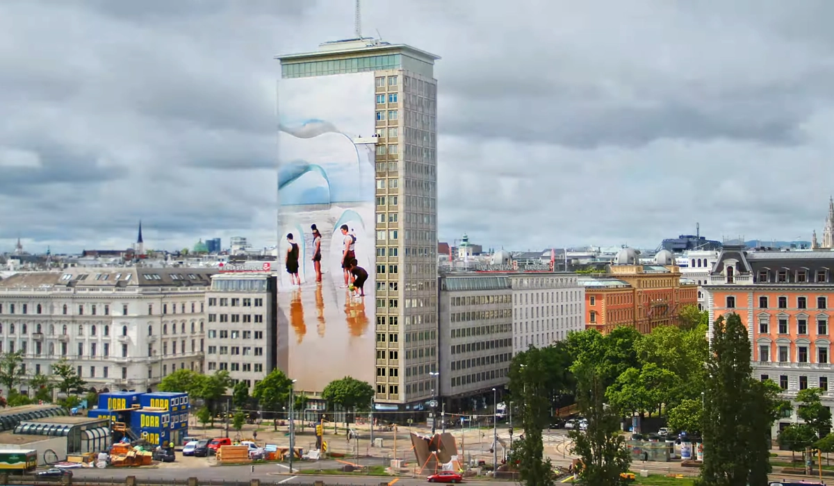 Facade Art of the Wiener Ringturm 2023 showing the work "Wandering Icebergs" by Slovenian artist Vanja Bućan in the middle of Vienna's city centre