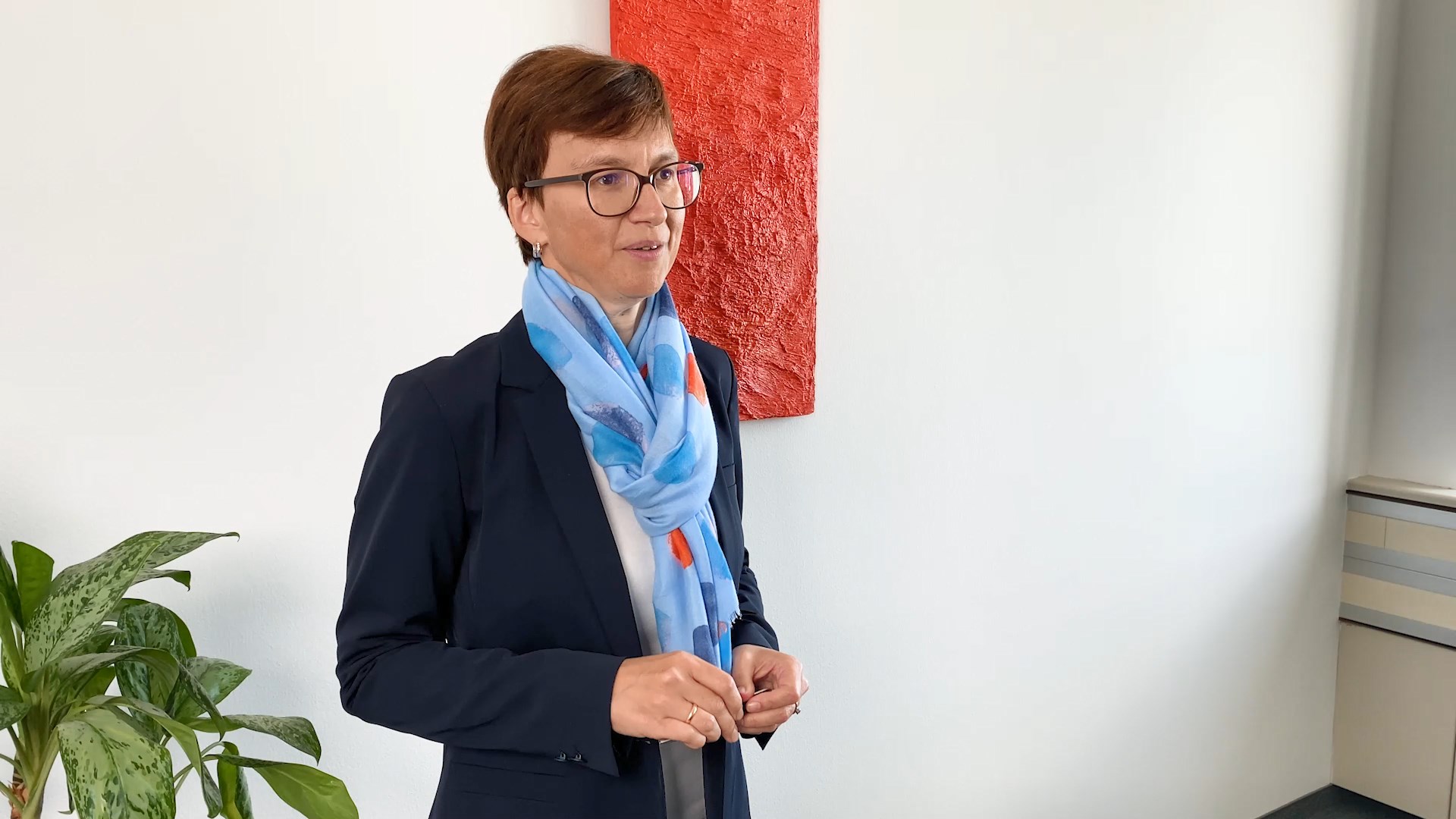 Nina Higatzberger-Schwarz, Head of VIG Investor Relations, standing in an office