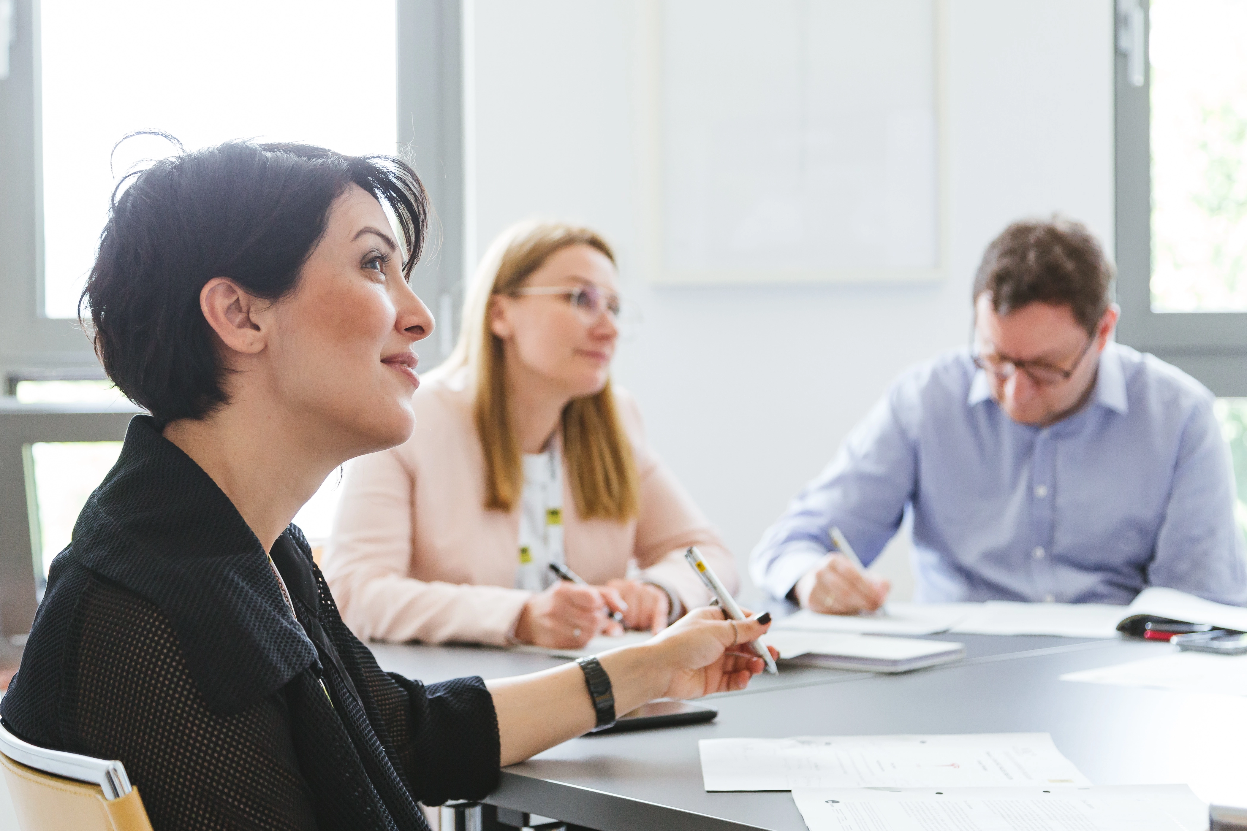 Two women and a man at a VIG training