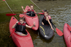Children kayaking at lake Millstättersee
