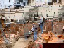 © Kniazha Ukrainian VIG colleagues build a wall